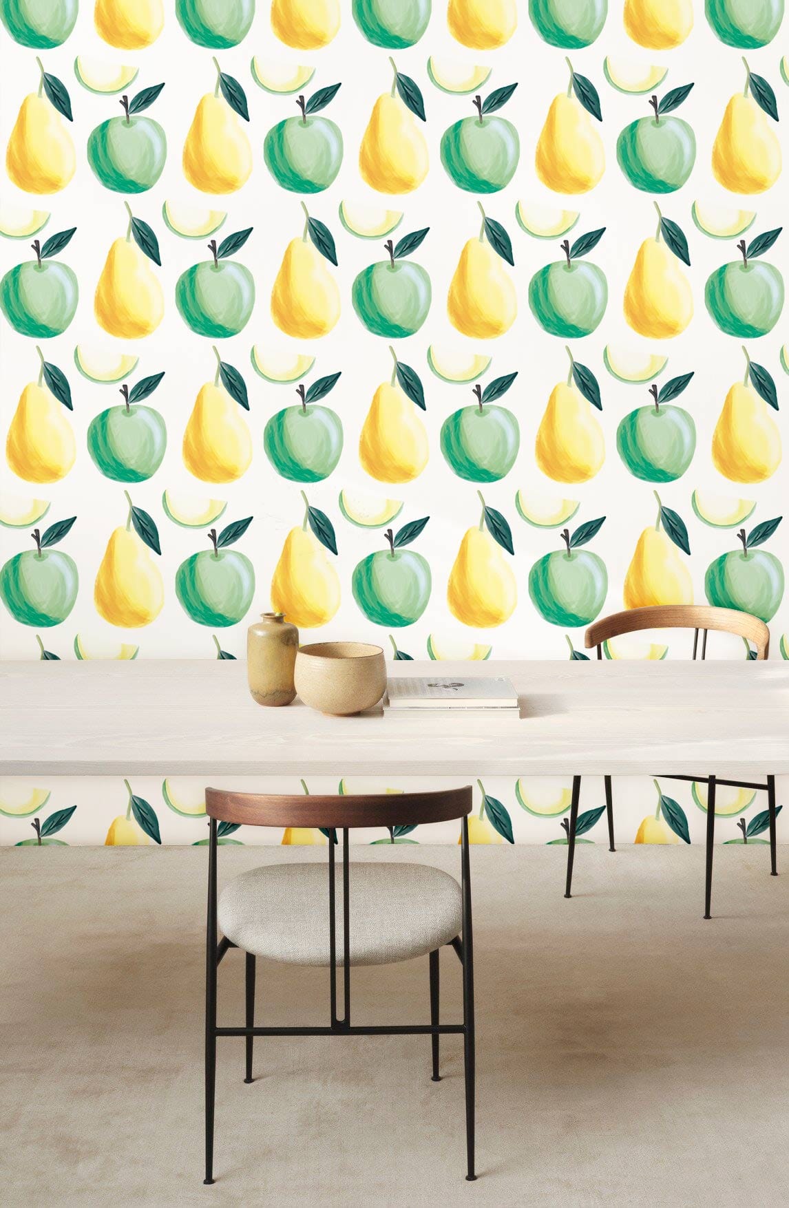 Fresh green apple and yellow pear wallpaper in dining room with modern chairs and table.