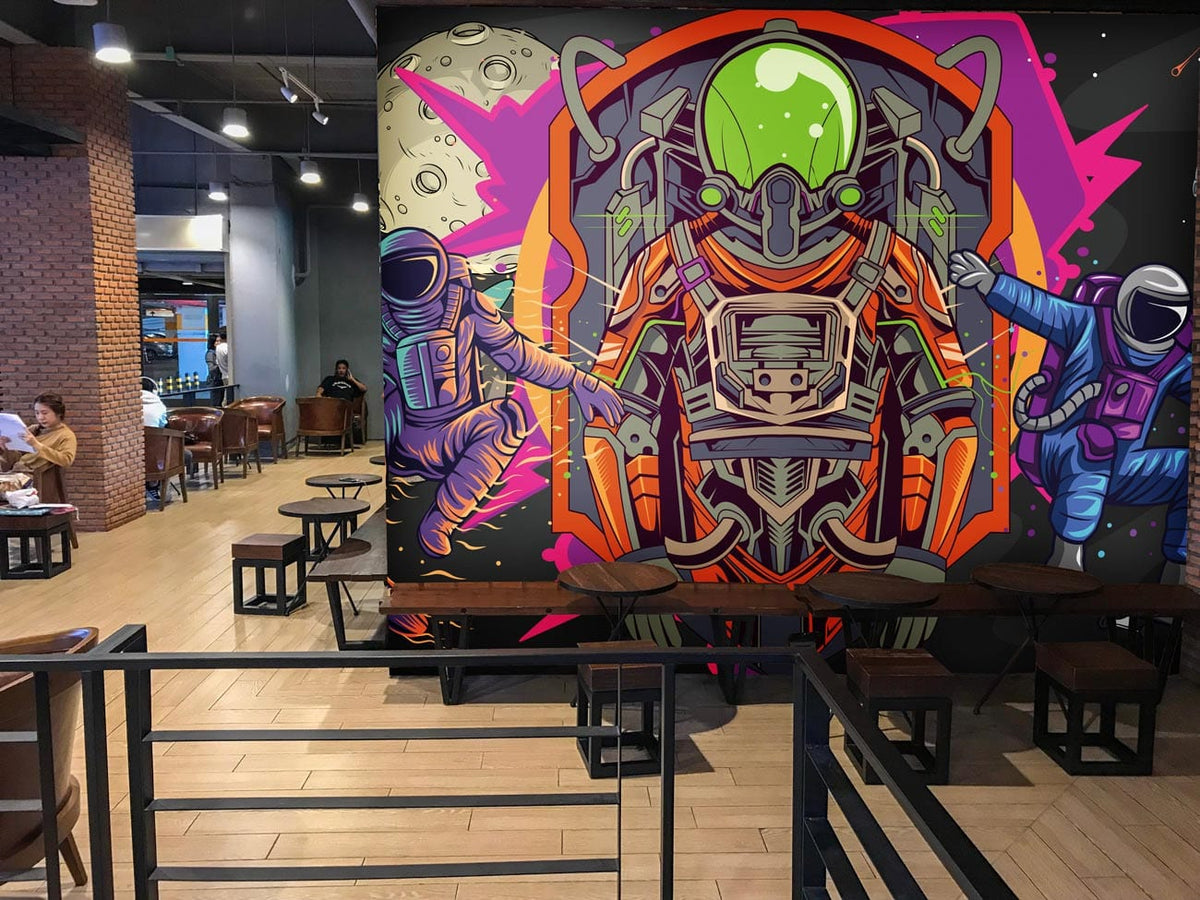 Futuristic space mural with astronauts, vibrant colours; featured in modern café with brick walls.
