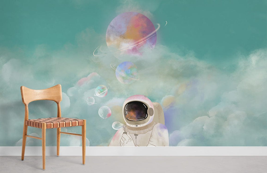 Galactic Dreamscape mural wallpaper with astronaut, pastel celestial clouds, wooden chair, grey flooring.