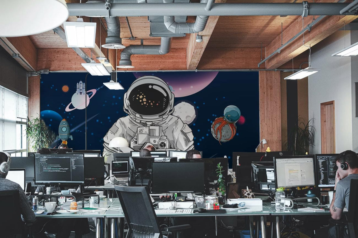 Space Adventure mural wallpaper with astronauts and rockets, navy blue in modern office setting.