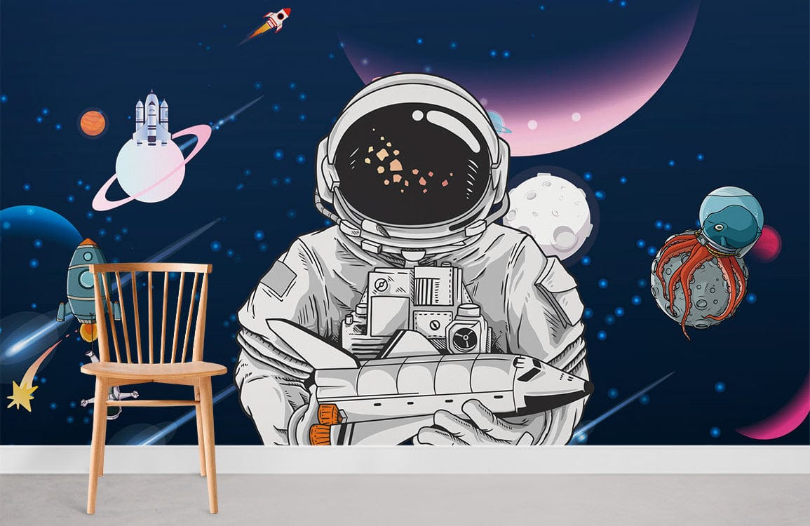 Navy blue mural wallpaper with astronauts, rockets, wooden chair, and space elements; modern room decor.