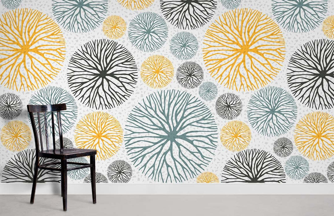 Modern Botanical Circles Wallpaper in yellow, blue, and black patterns, featuring black chair, grey flooring.