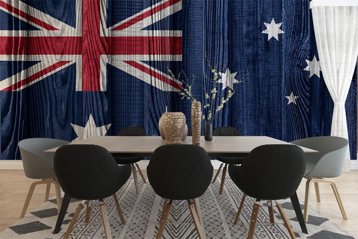 Dining room featuring rustic Australian flag wallpaper, grey chairs, wooden table, and geometric patterned rug.