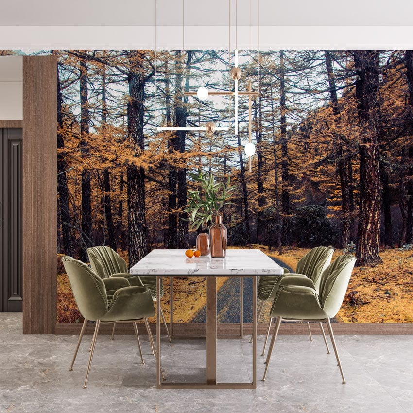 Autumn Forest Path Wallpaper in dining room with green chairs, marble table, modern pendant lights.