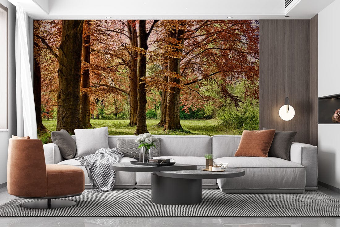 Modern living room featuring Autumn Forest Vibes mural, grey sofa, brown chair, and sleek round tables.