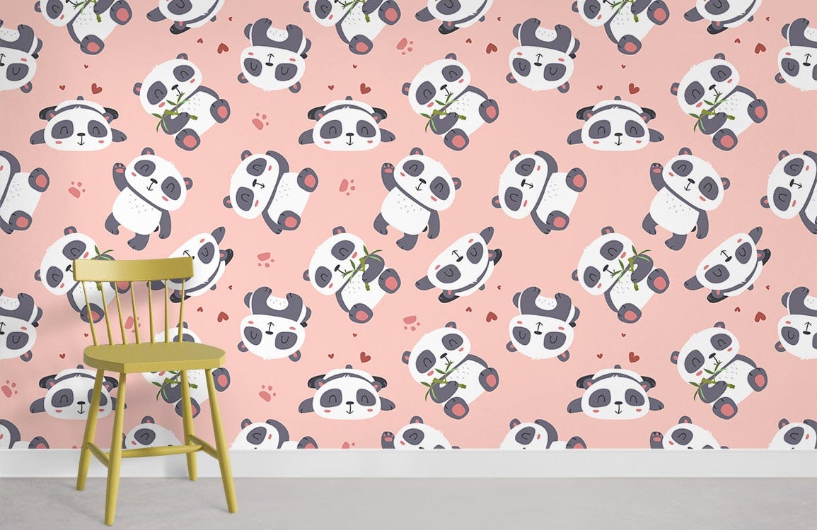 Adorable panda pastel nursery wallpaper, pink wall, green chair, grey flooring in children's room decor.