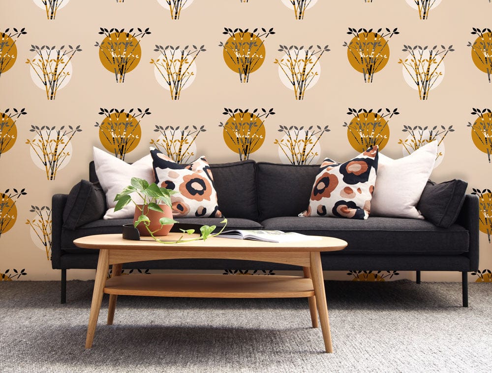 Vintage Golden Floral Motif Wallpaper in living room with dark grey sofa, modern coffee table, and carpet.