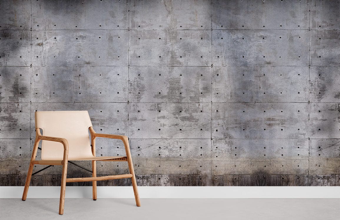 Industrial grey concrete-effect wallpaper in modern living room with beige wooden chair and grey floor.