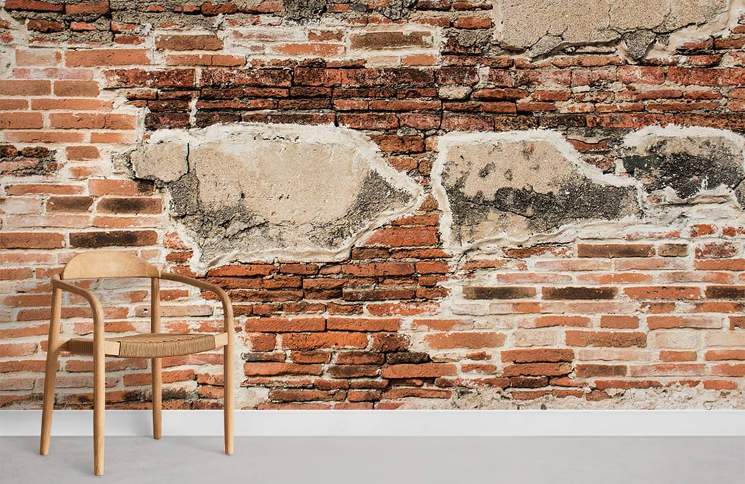 Rustic brick vintage weathered red mural wallpaper with wooden chair, industrial style decor, concrete flooring.