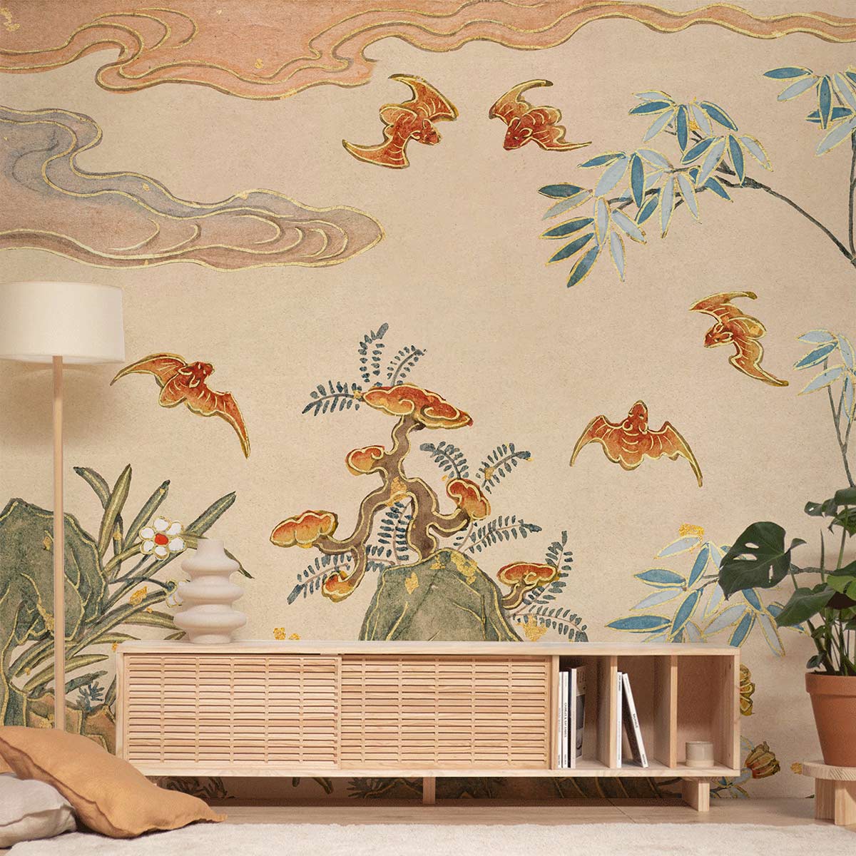 Oriental nature mural with bamboo, flying birds; neutral furniture, beige wall, living room setting.