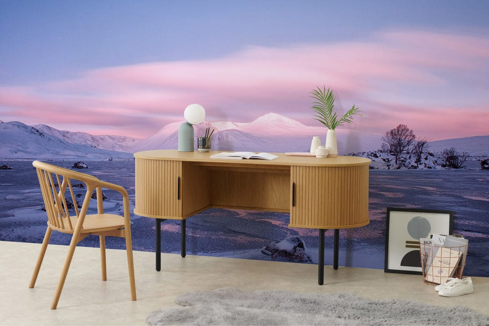Tranquil winter mural wallpaper with wooden desk, chair; complements light flooring, Scandinavian interior style.