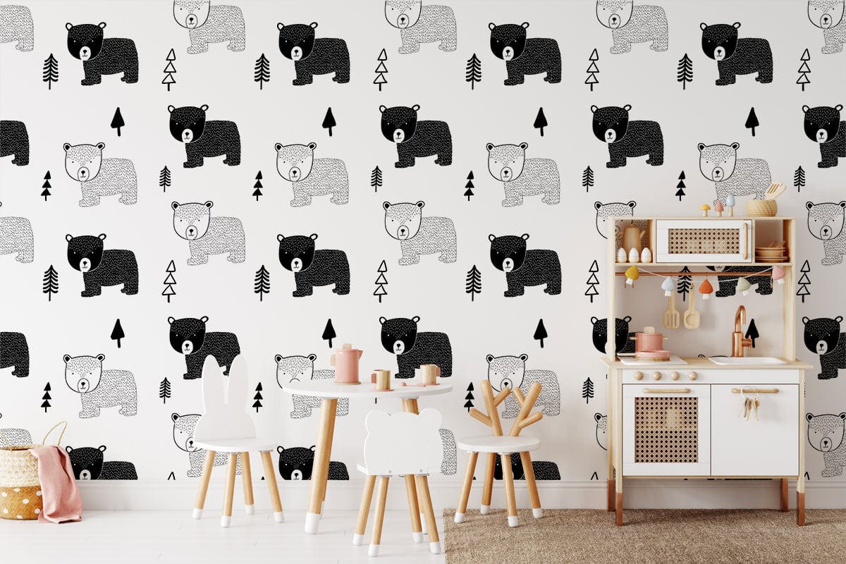 Monochrome bear and tree wallpaper, children's playroom decor, white chairs, and wooden play kitchen set.