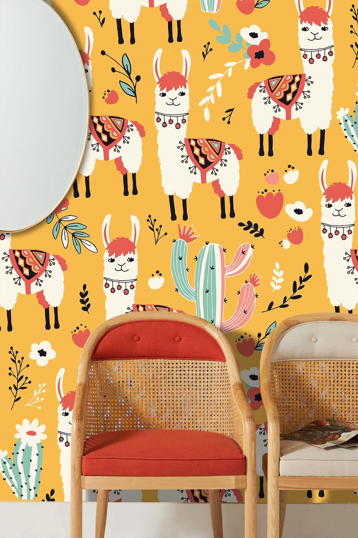 Playful Llama Safari Wallpaper in orange nursery with rattan chairs, cactus pattern, and mirror decor.