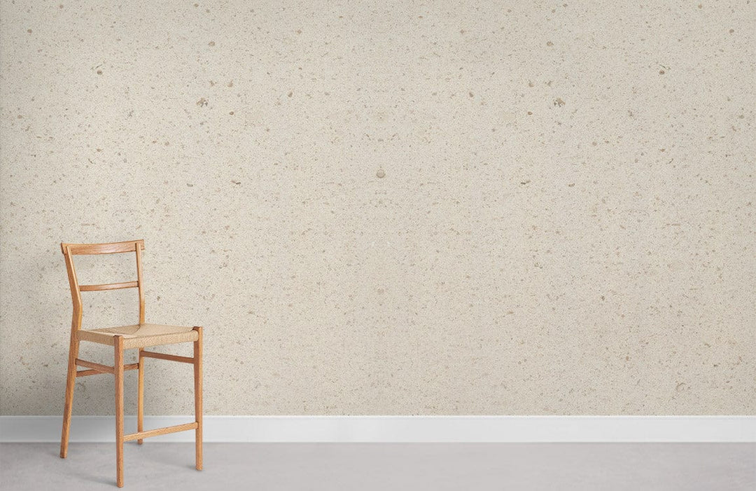 Elegant Cream Speckled Wallpaper with wooden chair, minimalist design, light grey flooring.
