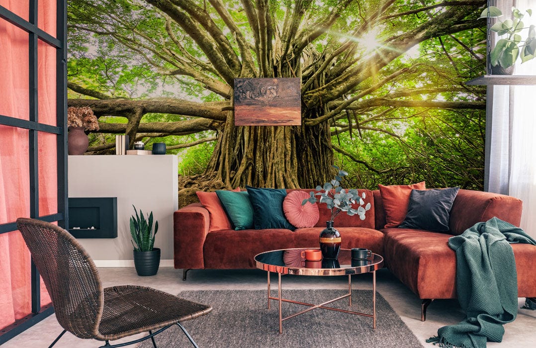 Majestic Green Forest Tree Mural Wallpaper in a stylish living room with a brown velvet sofa.