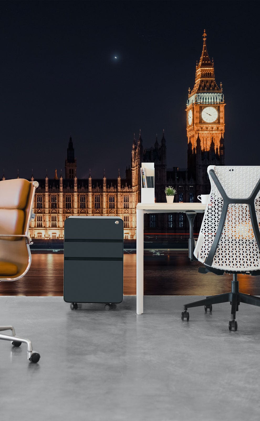 Office with Illuminated London Skyline Mural Wallpaper, modern chairs, desk, and grey concrete flooring.