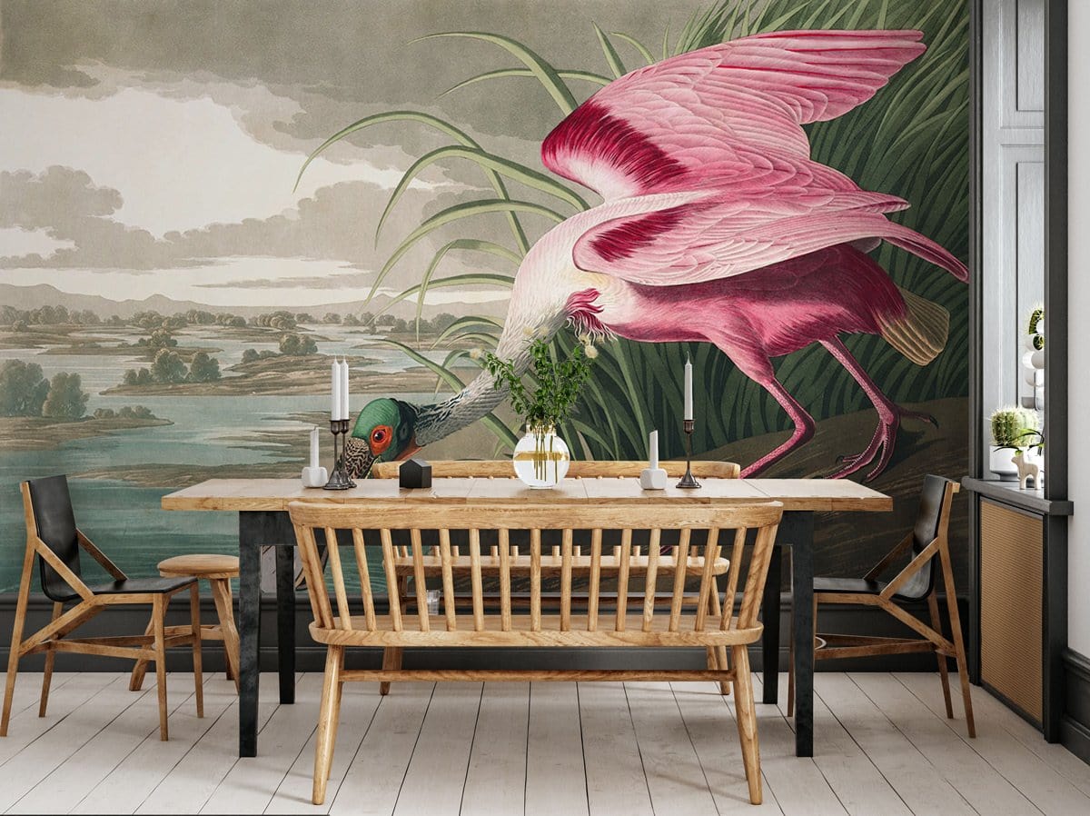 Vintage pink Spoonbill bird mural wallpaper in dining room with wooden furniture and light flooring.