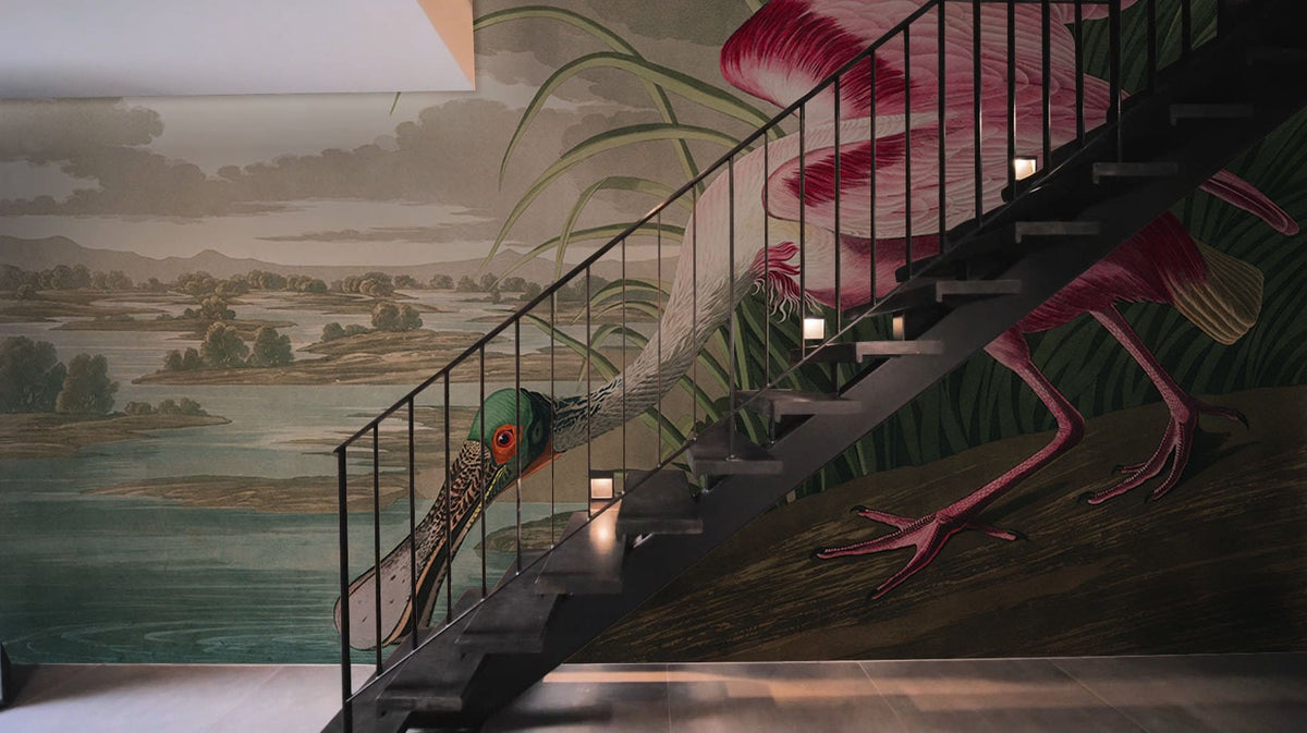 Vintage Pink Spoonbill Bird mural wallpaper on stairway, featuring nature art decor and sleek flooring.