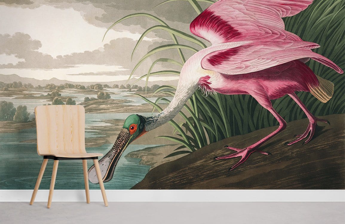 Vintage pink spoonbill bird mural wallpaper in living room; wooden chair, light grey floor.