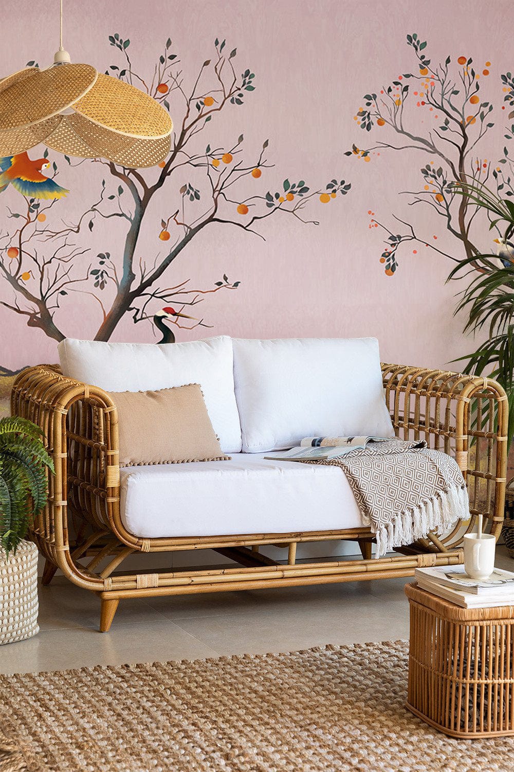 Vintage Oriental Crane Mural Wallpaper with Birds, wicker sofa, rattan furniture, and neutral decor accents.