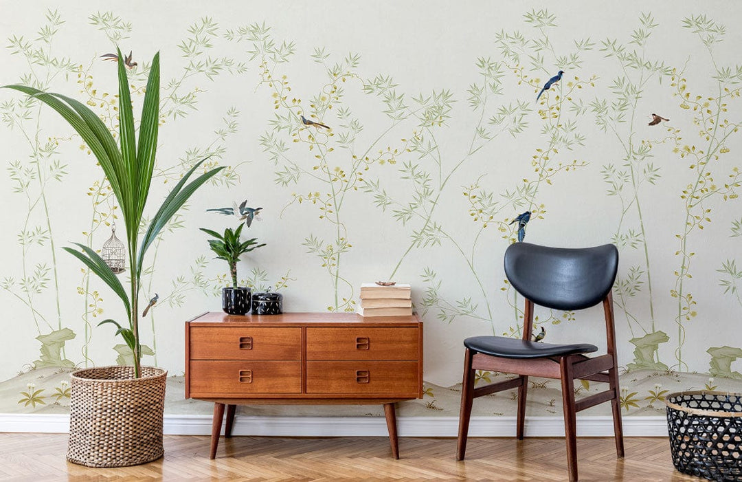 Serene Nature Scene Mural Wallpaper features birds; retro sideboard, modern chair; wooden parquet flooring.