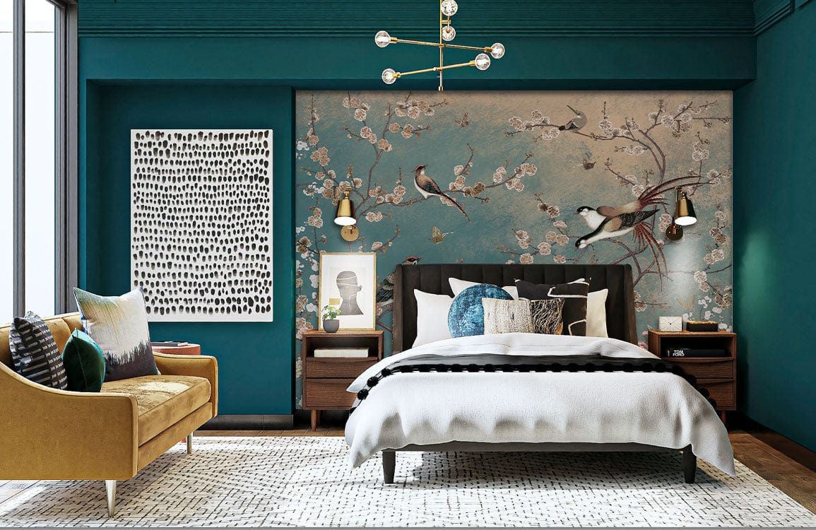 Elegant Vintage Chinoiserie bird wallpaper, teal walls, gold sofa, contemporary bedroom, stylish lighting.