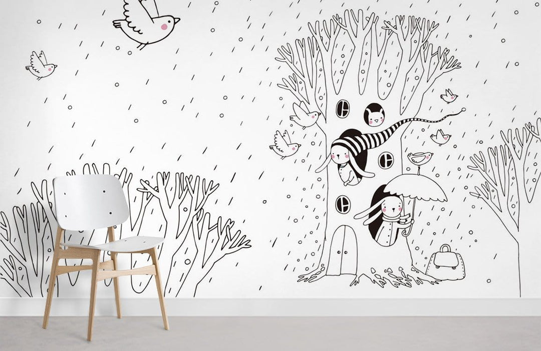 Monochrome whimsical winter forest mural in children's room, featuring birds, white chair, grey flooring.