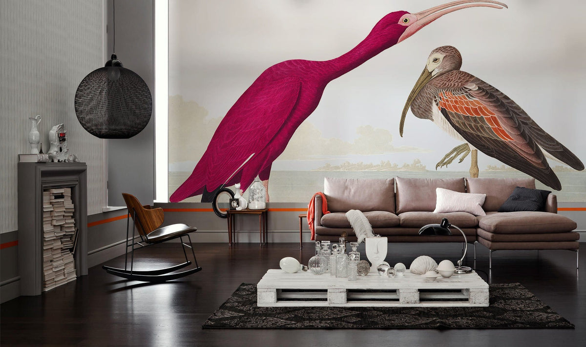 Exquisite wallpaper with vintage birds, scarlet tones, grey sofa, dark wood flooring, modern living room.