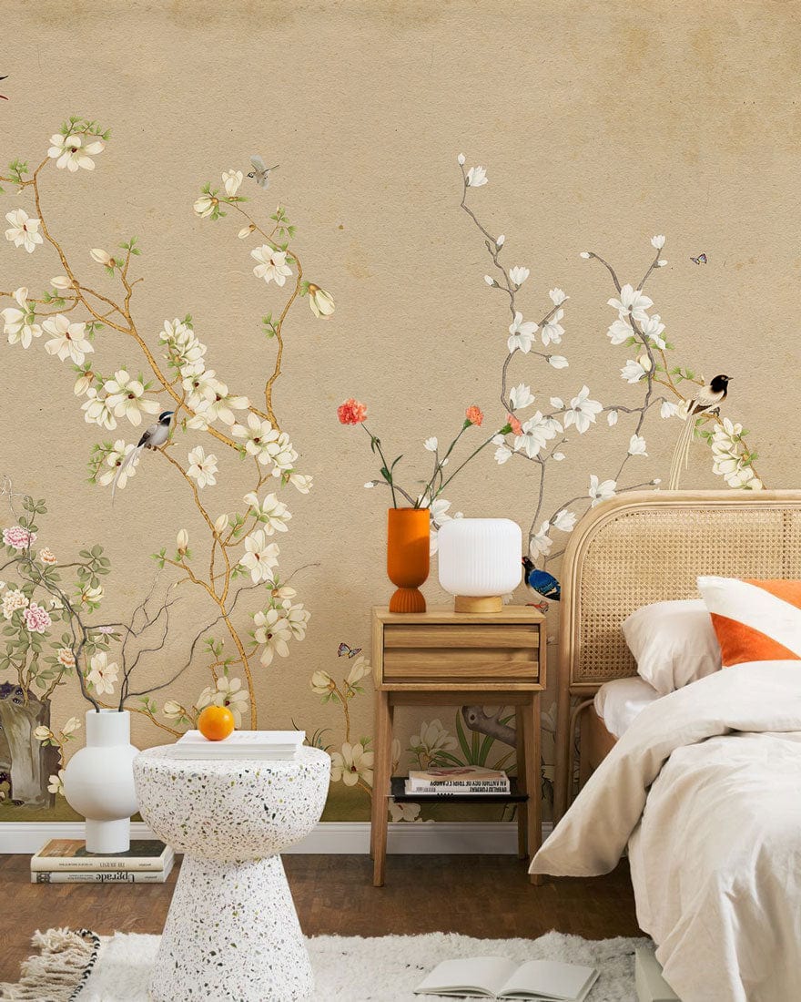 Elegant Vintage Floral Birds Beige Mural Wallpaper in bedroom with wicker headboard, wooden side table.