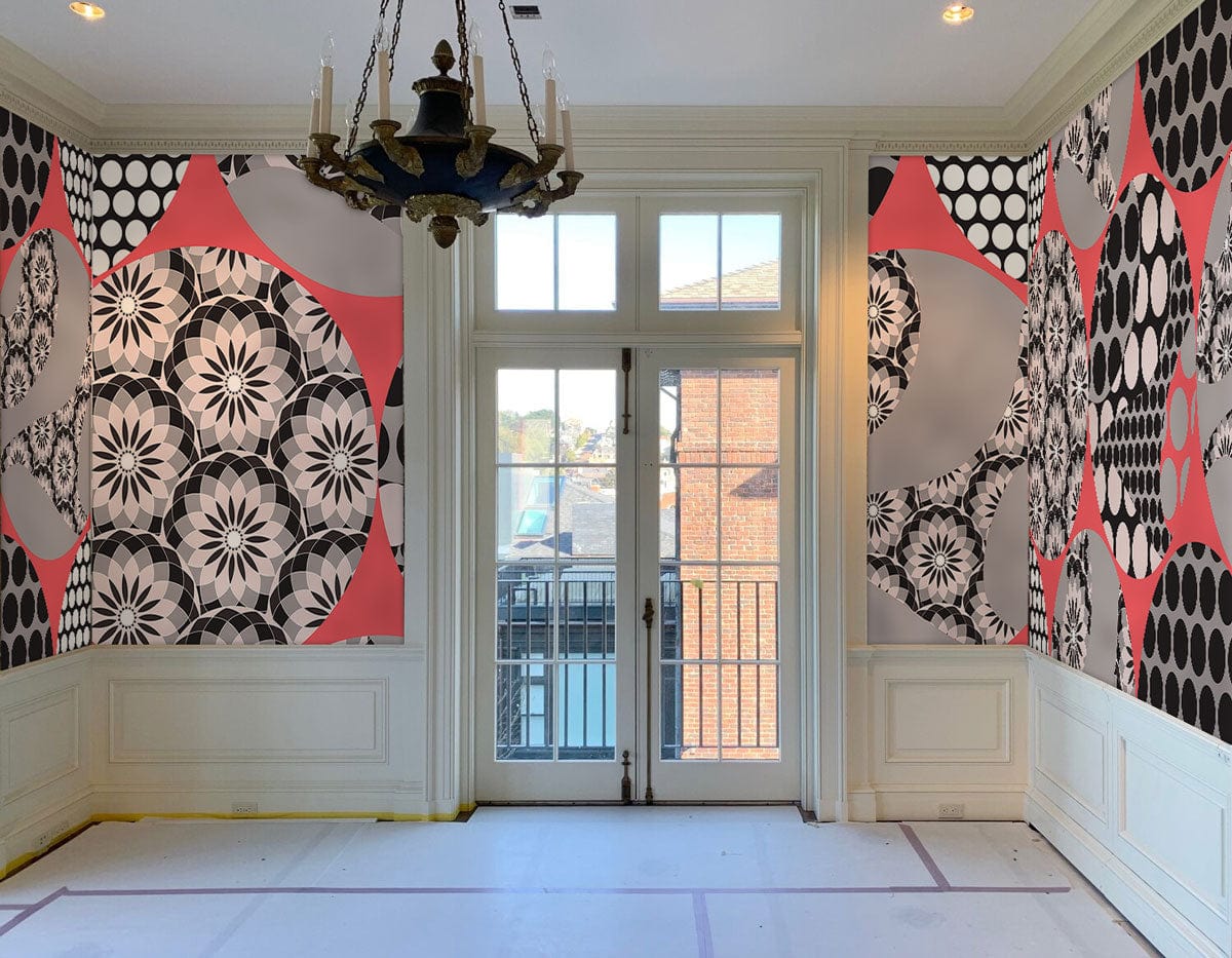 Retro Geometric Circles Wallpaper in pink, black, grey; spacious room, ornate chandelier, elegant panelling.