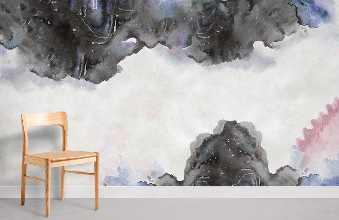 Abstract watercolour mountain mural wallpaper in grey and blue tones with wooden chair and grey flooring.