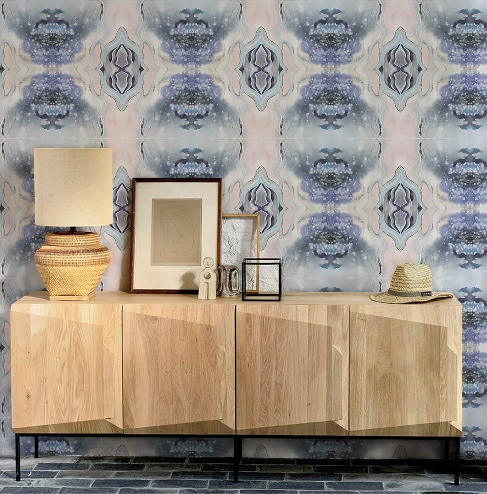 Elegant Pastel Watercolour Wallpaper in living room with wooden sideboard, lamp, and basket hat decor.