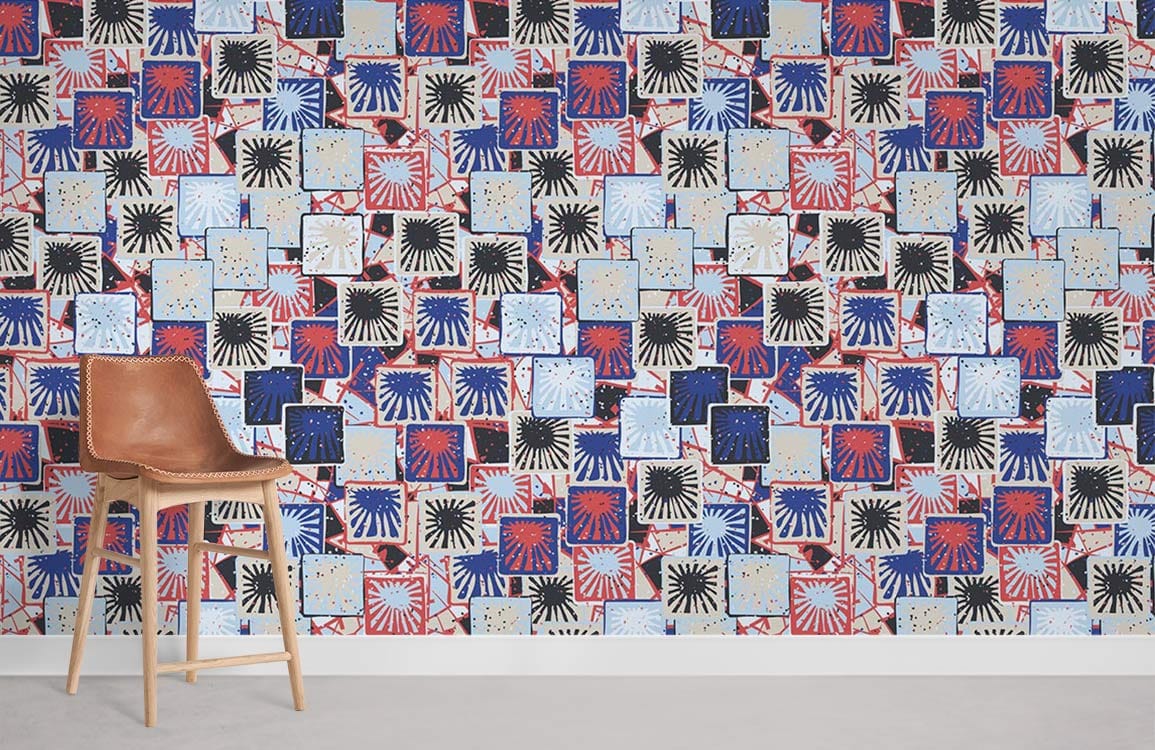 Retro Geometric Tile Patterned Wallpaper, vibrant design with red, blue, black; minimal brown leather chair.