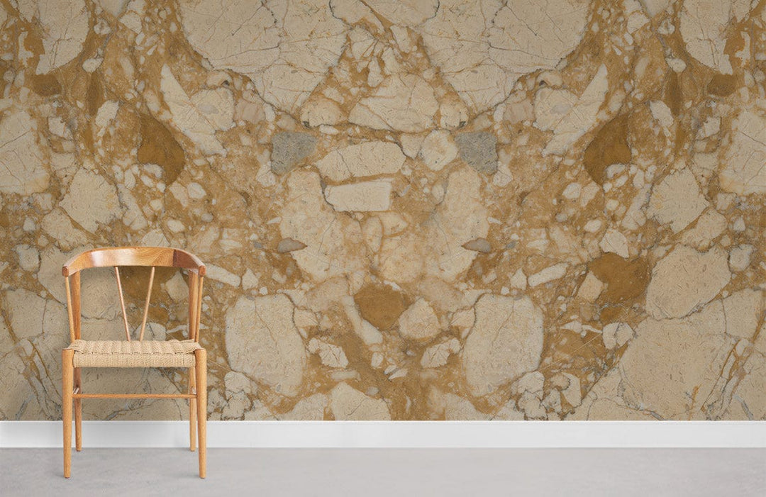 Gold and cream marble effect wallpaper mural with wooden chair, grey carpet, luxurious interior design.