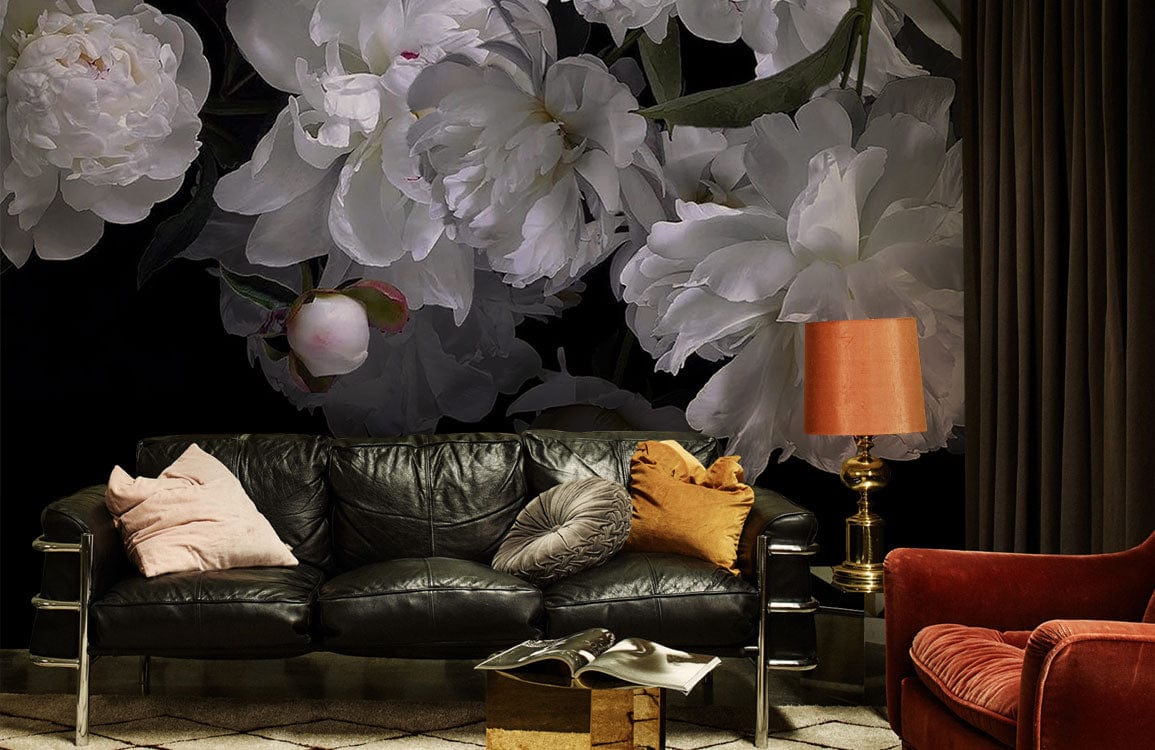 Elegant white peony floral wallpaper, dark background, black leather sofa, vintage lamp, plush rug.