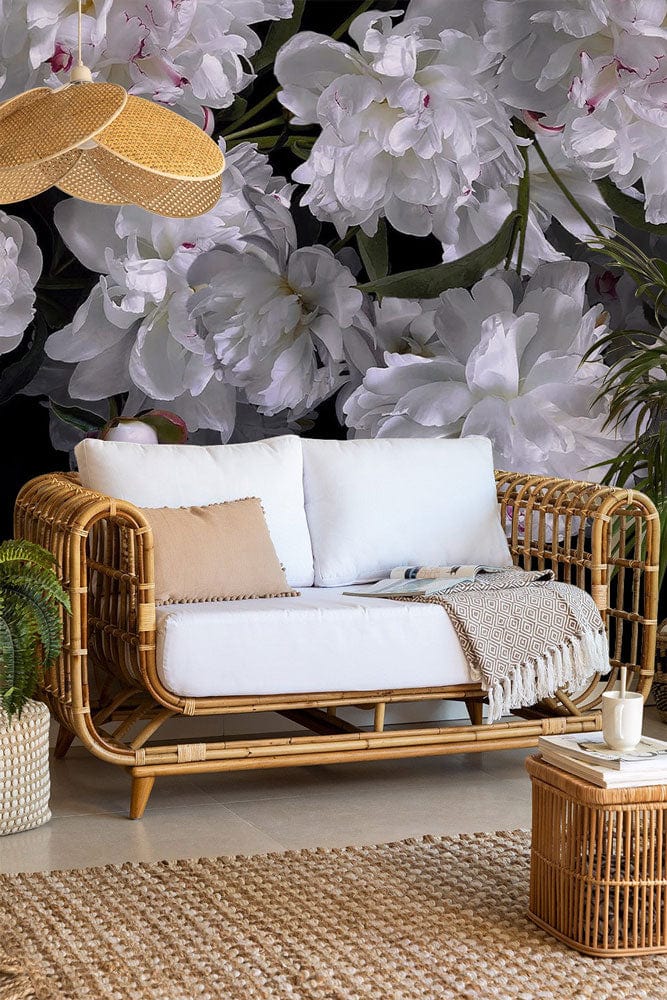 Elegant White Peony wallpaper, dark background, bamboo sofa, white cushions, woven flooring, modern living room.