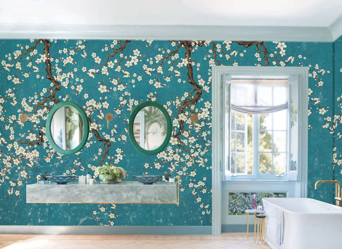 Teal Blossom Branches Vintage Floral Wallpaper Mural in elegant bathroom with twin mirrors and bathtub.