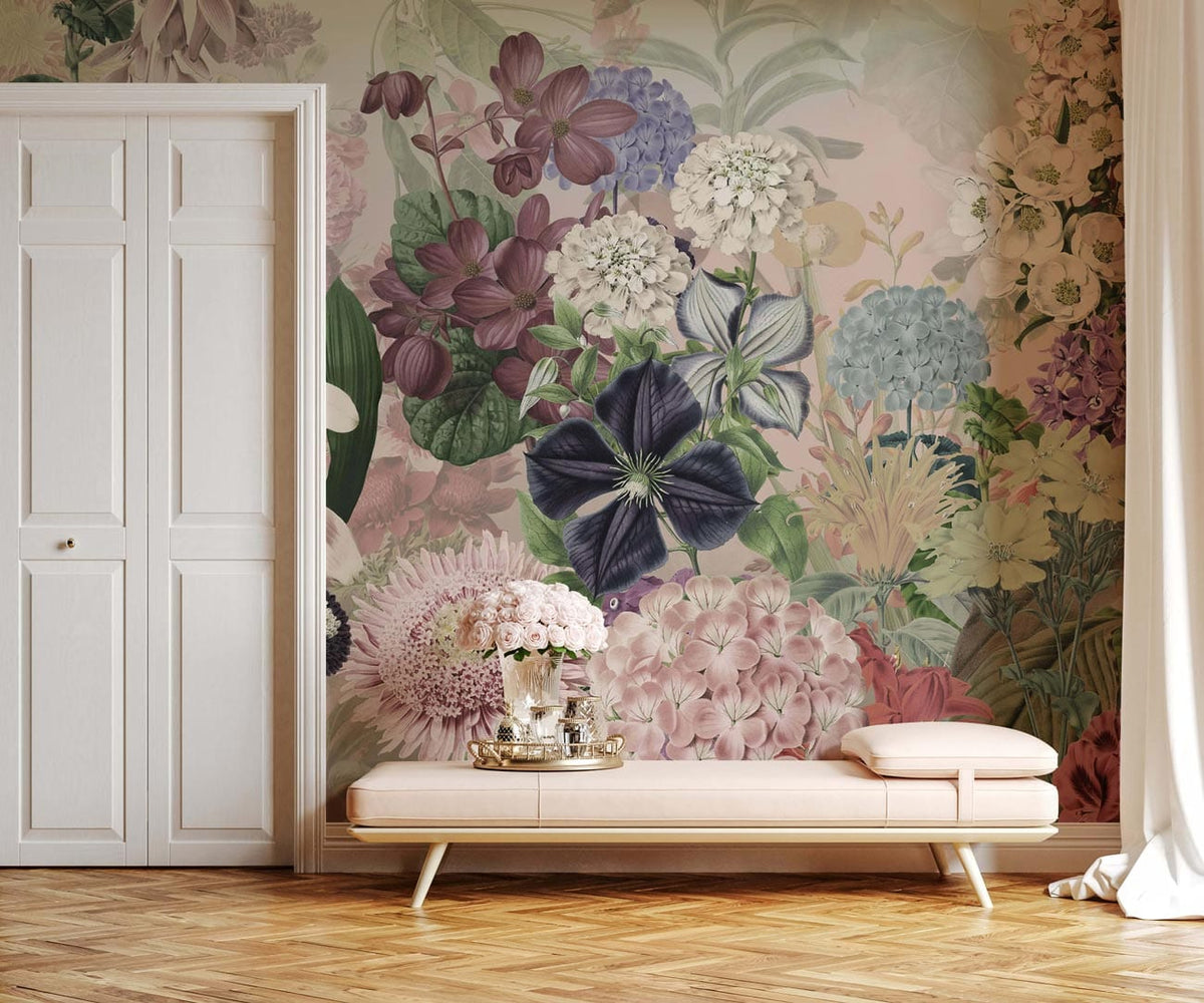 Vintage floral garden mural wallpaper brightens pastel room with elegant cream sofa, parquet flooring.