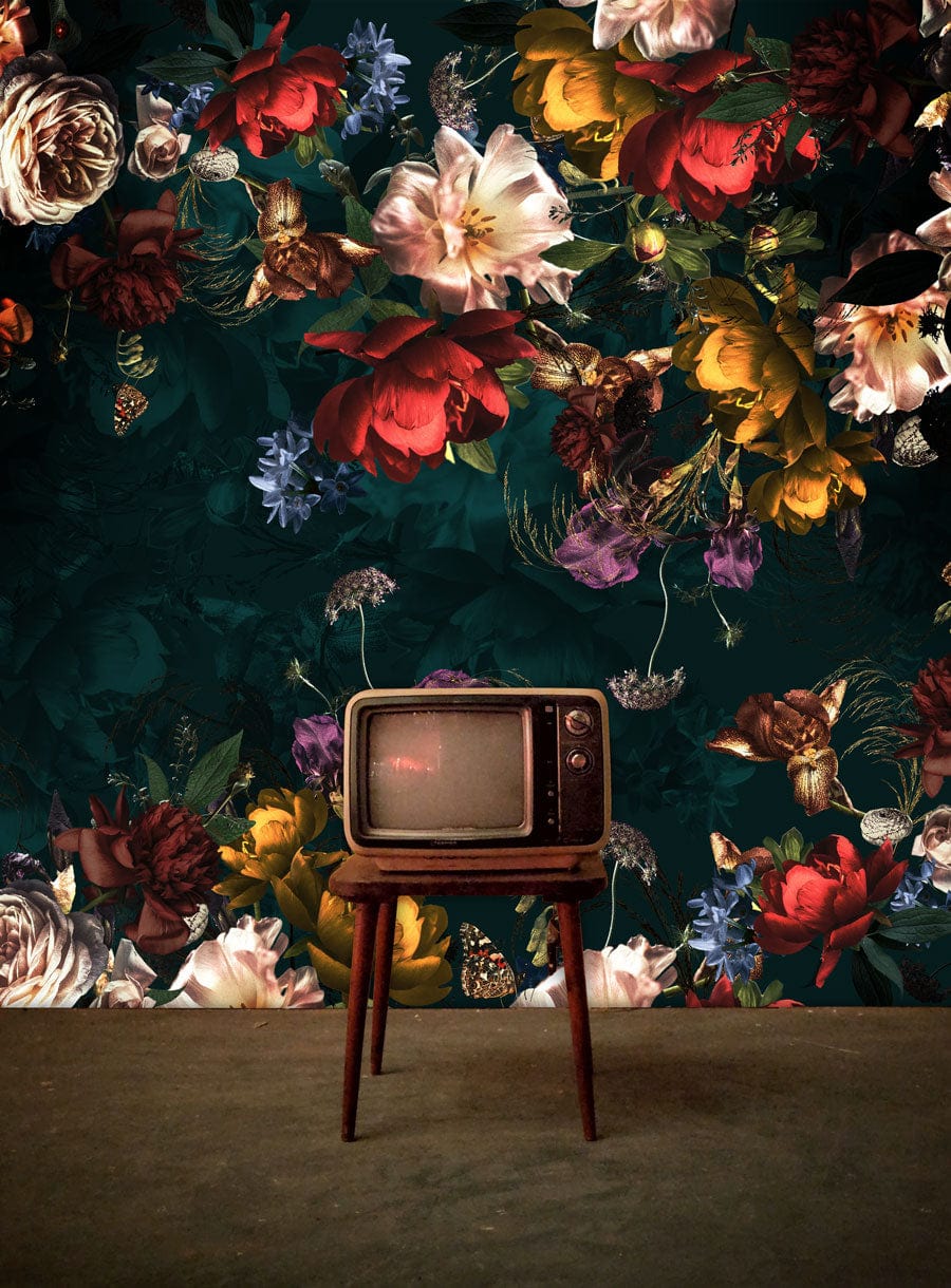 Luxurious dark floral garden wallpaper with colourful blooms, vintage TV, wooden floor, and green wall.