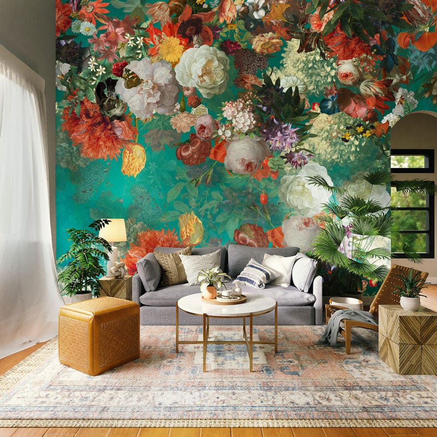 Vibrant Floral Symphony: Teal Garden Elegance Wallpaper in living room with grey sofa, patterned rug.