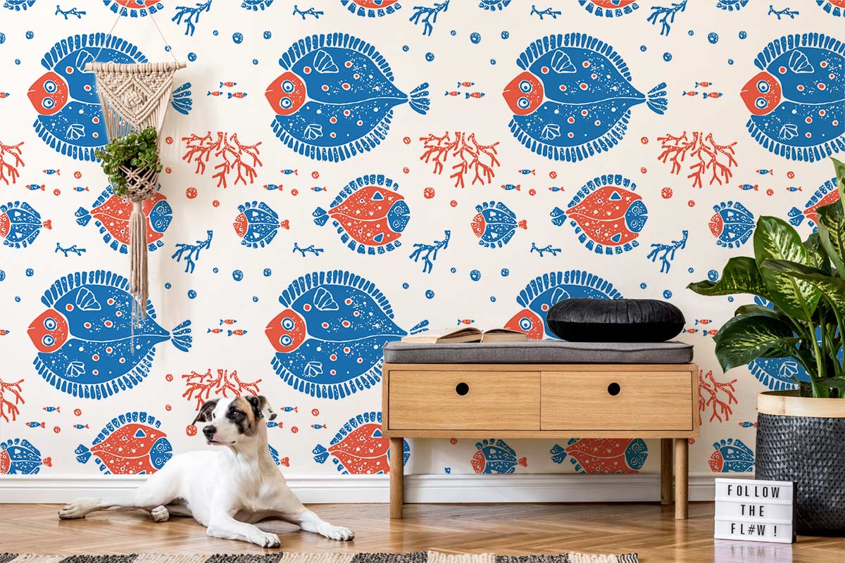 Playful Blue and Red Fish Pattern Wallpaper in Coastal Kids' Room with Wooden Cabinet and Dog.