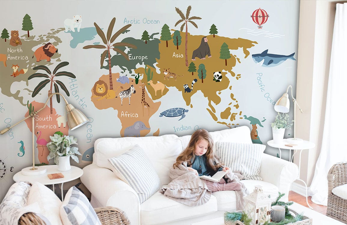 Whimsical World Map Mural Wallpaper in kids' room with white sofa, light flooring, playful decor accents.