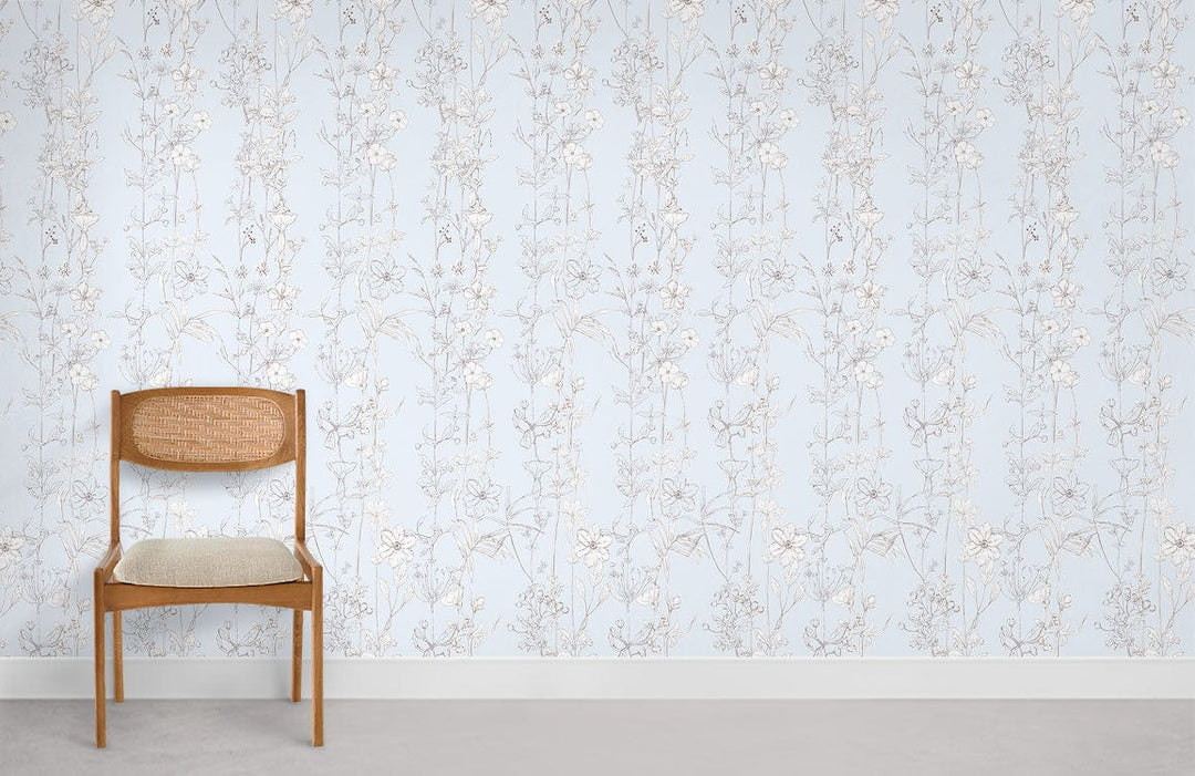 Elegant light blue floral wallpaper with delicate botanical design complements minimalist wooden chair, grey flooring.
