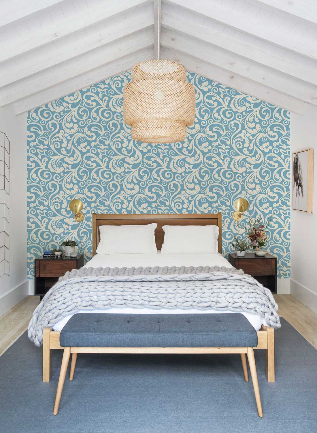 Elegant blue paisley pattern wallpaper in vintage-style bedroom, with wooden bed and grey rug.