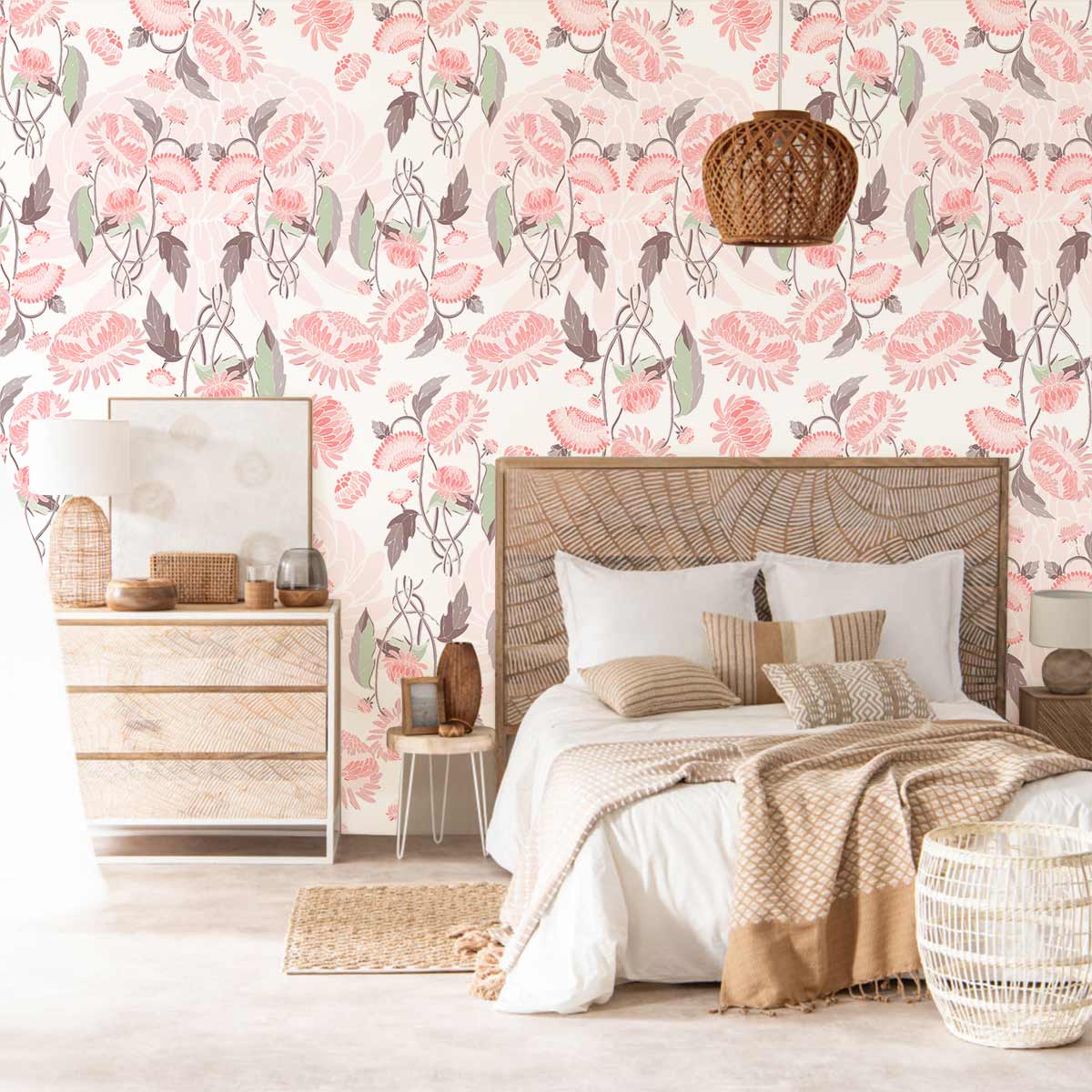 Elegant vintage floral wallpaper in soft pink and green tones, wicker bed, natural wood dresser.