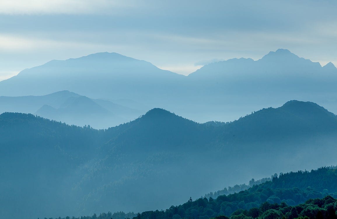 Tranquil Blue Mountain Landscape Mural Wallpaper for Serene Home Décor