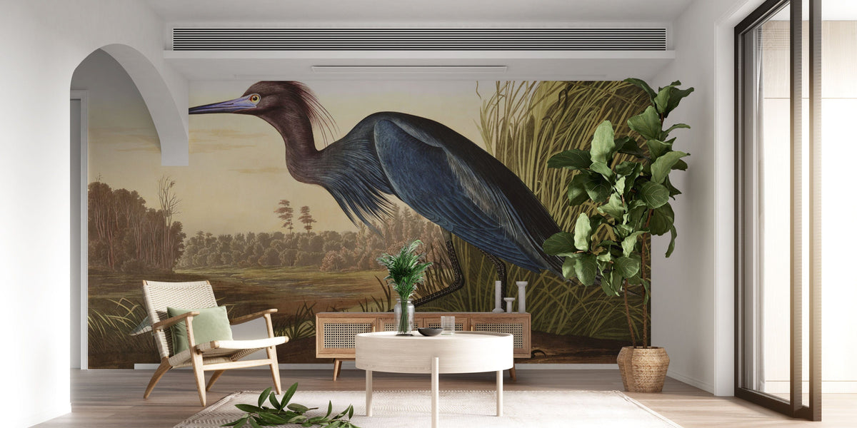 Elegant Blue Heron mural wallpaper with vintage decor, armchair, wooden flooring, and neutral walls.