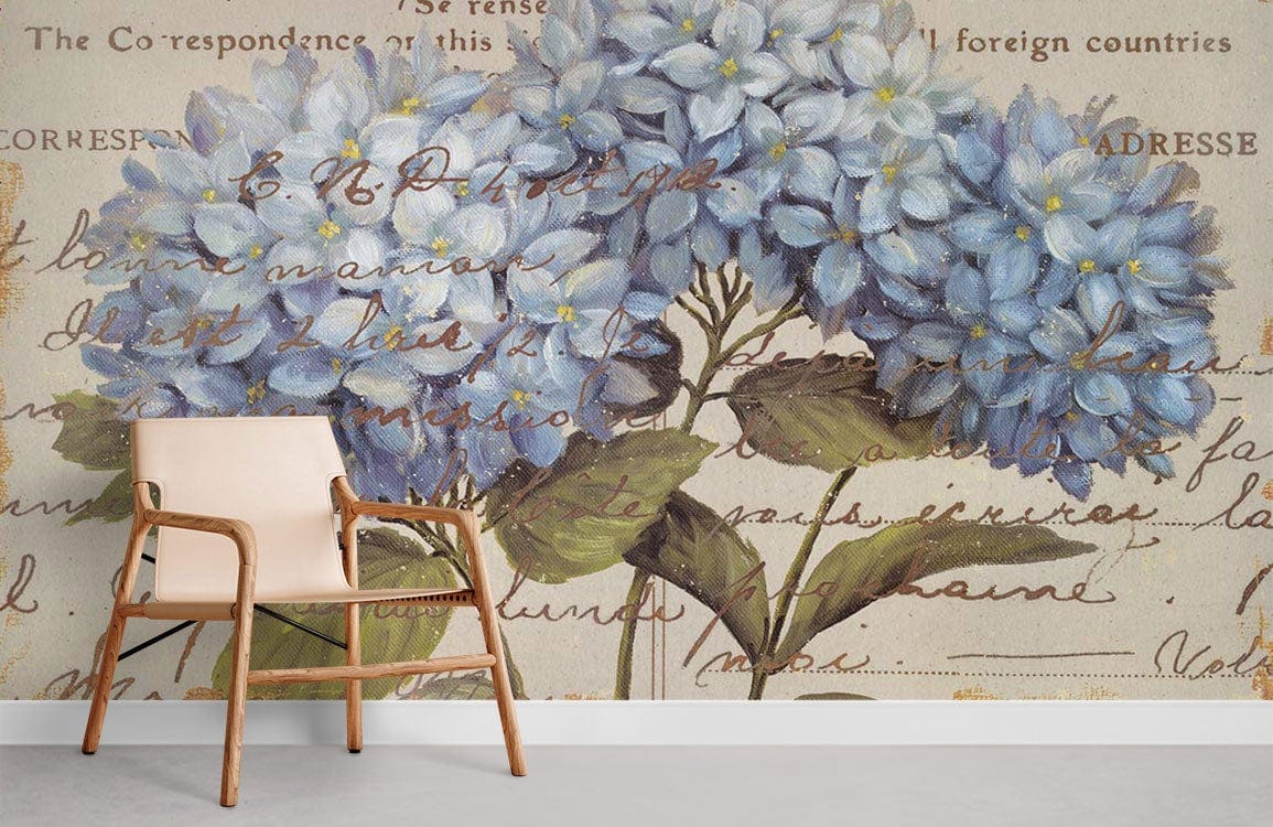 Vintage Blue Hydrangea Floral Postcard Mural Wallpaper with Script, beige armchair, modern grey flooring.
