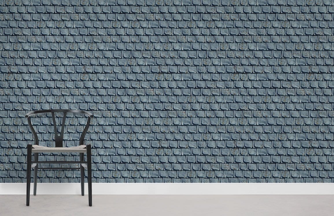 Grey rustic brick wallpaper in room with black chair, concrete flooring, vintage style Décor.