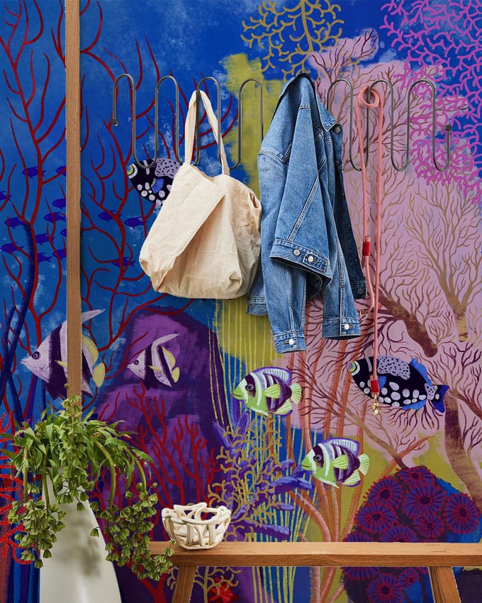 Tropical Underwater Paradise mural wallpaper with jacket, bag on wooden rack, enhancing vibrant decor.